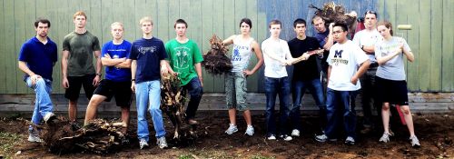 GOAL—“A Few Good Student Men” help the community with house and yard work.
