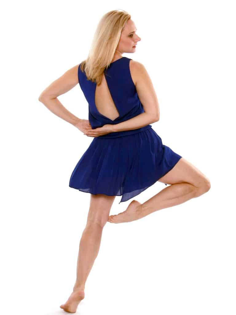 Holly Hobbs dancing in a blue dress.