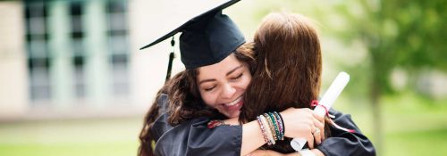 Graduation Girl Hugging Mom