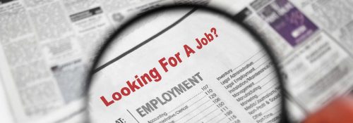 A newspaper clipping with the words, “Looking for a job?”
