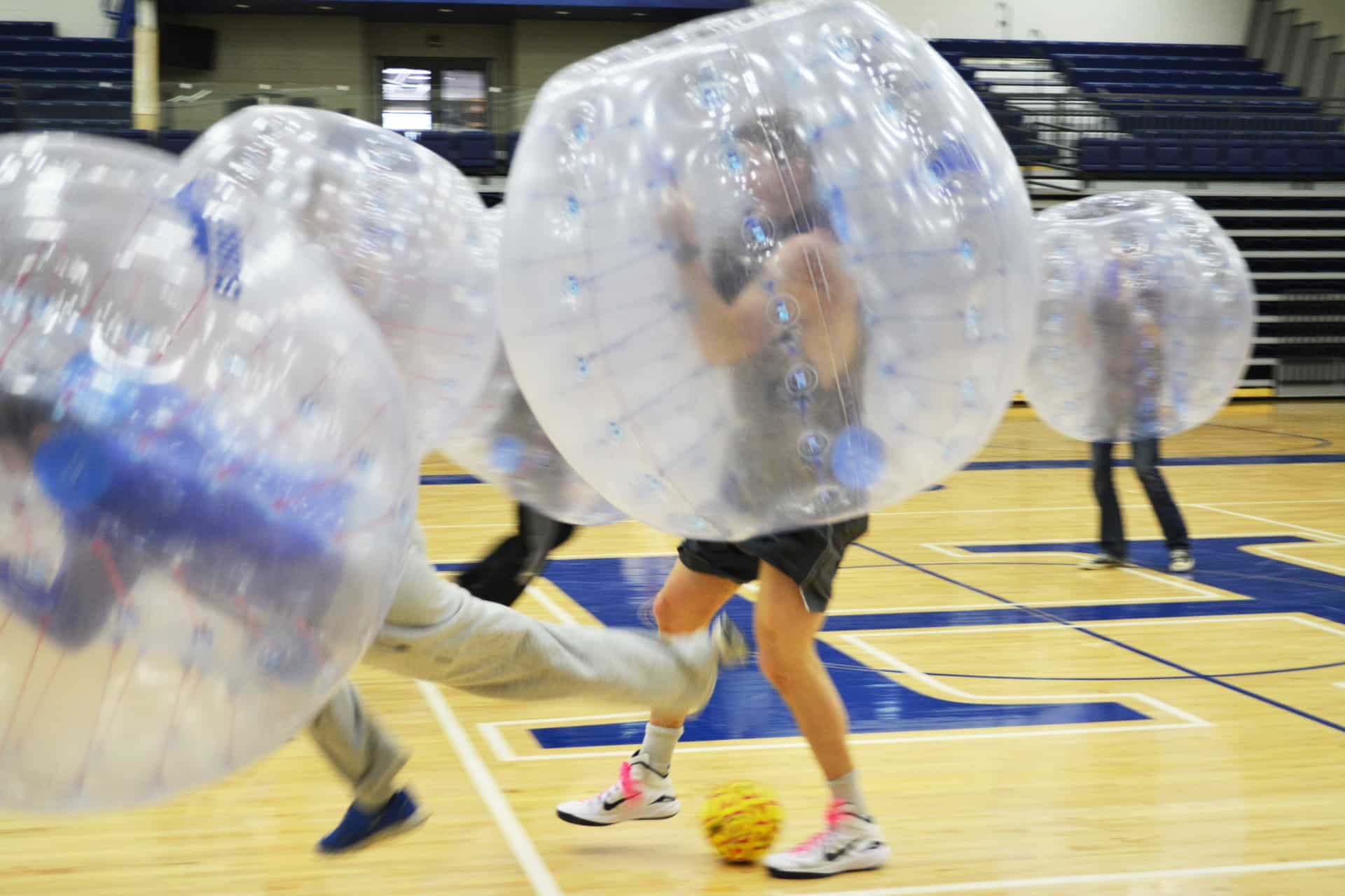 Students playing Bubble Soccer.