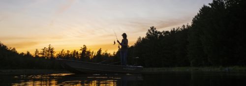 Student fishing on Rockwell Lake