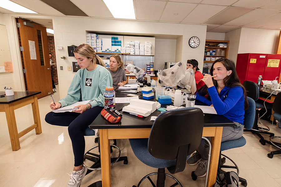 The Herbert Henry Dow Science Building interior, students in a lab